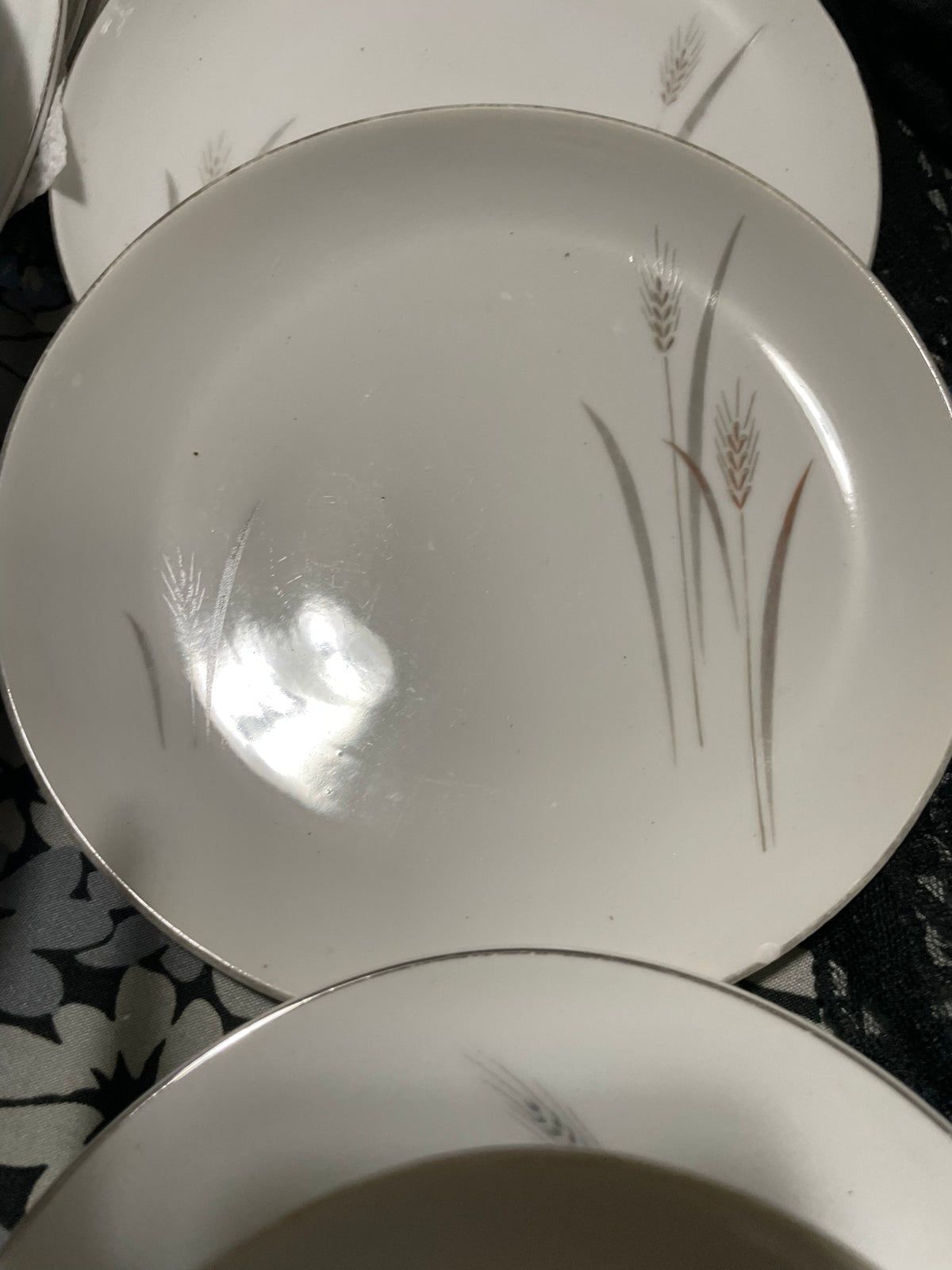 24 piece Platinum Wheat pattern dishes. They manufactured by Fine China of Japan between 1950-1970.