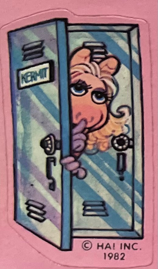 Ms. Piggy Sneaking into Kermit's Locker Sticker